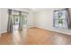 Empty bedroom with tiled floor, sliding door and window at 1509 Trenton Ln, The Villages, FL 32162