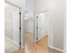 Hallway featuring doorways to other rooms at 1509 Trenton Ln, The Villages, FL 32162