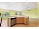 Corner view of the kitchen showcasing a sink, dishwasher, and open access to the living area at 1509 Trenton Ln, The Villages, FL 32162