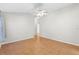 Bright living room featuring tile flooring, a ceiling fan, and fresh neutral paint for a modern aesthetic at 1509 Trenton Ln, The Villages, FL 32162