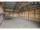 A view inside the empty barn ready for your animals with an open floor plan at 15104 County Road 48, Astatula, FL 34705