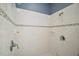 Shower area with tile and dual shower heads at 15104 County Road 48, Astatula, FL 34705