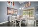 Dining area with slider access to outdoor pool at 15104 County Road 48, Astatula, FL 34705