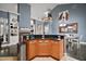 Stylish kitchen with granite countertops, custom cabinets, and an open layout to the living areas at 15104 County Road 48, Astatula, FL 34705