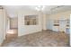 Open dining area with tile flooring connecting to other living spaces in the home at 15925 Summit Ct, Clermont, FL 34711