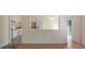 Open dining area with tile flooring and an opening to the kitchen and sliding glass doors at 15925 Summit Ct, Clermont, FL 34711