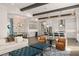 Open floor plan showcasing the living room, dining area, and gourmet kitchen at 16030 Vetta Dr, Bella Collina, FL 34756