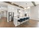 Gourmet kitchen with a large island, stainless steel appliances, and a breakfast bar at 16030 Vetta Dr, Bella Collina, FL 34756