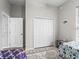 Bedroom with large closet, ceiling fan and bright natural light from large window at 16863 Se 110Th Court Rd, Summerfield, FL 34491