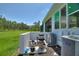 This home features modern AC units, a pool pump, and sleek white exterior walls at 1702 Hidden Palms Dr, Davenport, FL 33897