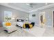 Beautiful main bedroom featuring tray ceilings, ample natural light, and modern décor at 1702 Hidden Palms Dr, Davenport, FL 33897