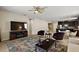 Spacious living area with tile floors, and an open layout into the kitchen at 20945 Oldenburg Loop, Mount Dora, FL 32757