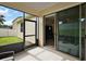 The screened patio features access to a beautiful grassy yard and open living space at 20945 Oldenburg Loop, Mount Dora, FL 32757