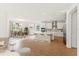 Open floor plan with a kitchen island, dining area, and lots of natural light at 2208 Keystone Pass Blvd, Minneola, FL 34715