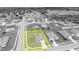 Aerial view of a highlighted property within a community, emphasizing the lot size and surrounding neighborhood layout at 2488 Begonia St, Mascotte, FL 34753