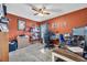 Bedroom with neutral carpet, ceiling fan, and a cozy ambiance perfect for relaxation at 2488 Begonia St, Mascotte, FL 34753