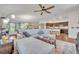 Bright and open living space seamlessly connects to dining area and kitchen, with plenty of natural light at 2488 Begonia St, Mascotte, FL 34753