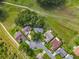 Overhead aerial view of residential homes in a well-maintained neighborhood near a lush golf course at 26338 Glen Eagle, Leesburg, FL 34748