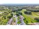 Beautiful aerial view of the community highlighting its lush greenery and spacious lots at 26338 Glen Eagle, Leesburg, FL 34748