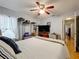 Comfortable bedroom with ceiling fan, and view into hallway at 26338 Glen Eagle, Leesburg, FL 34748