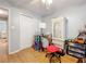 Well-lit bedroom with laminate floors and large closet space for all your storage needs and easy organization at 26338 Glen Eagle, Leesburg, FL 34748