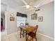 Charming breakfast nook featuring a wooden table, chair, and ceiling fan at 26338 Glen Eagle, Leesburg, FL 34748