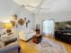Cozy living room features vaulted ceilings, ceiling fan and stylish decor at 26338 Glen Eagle, Leesburg, FL 34748