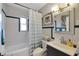 Bathroom featuring white subway tile, updated vanity and neutral accents at 30523 Orange Dr, Leesburg, FL 34748