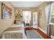 Bedroom includes hardwood floors, art and mirror at 30523 Orange Dr, Leesburg, FL 34748