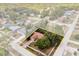 Aerial view of the property showcases its location, landscaping, and proximity to neighborhood amenities at 3184 Maltby Dr, Deltona, FL 32738