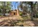 Spacious backyard surrounded by mature trees provides a tranquil, shaded retreat and an appealing outdoor space at 3184 Maltby Dr, Deltona, FL 32738
