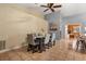 Open dining room with table, six chairs, and neutral tones at 3184 Maltby Dr, Deltona, FL 32738