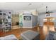 Spacious living room with hardwood floors, showcasing ample natural light and an open flow to other rooms at 3184 Maltby Dr, Deltona, FL 32738