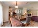 Cozy dining area with modern furniture and stylish accents in open-concept space at 3359 County Road 513, Wildwood, FL 34785