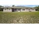 Single story home with screened porch and lovely, well-kept lawn at 37007 Forestdel Dr, Eustis, FL 32736