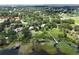 Beautiful lot has access to the water and a private dock for fishing or boating, outlined in red at 37138 Lake Yale Pl, Grand Island, FL 32735