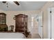 Bedroom with a decorative wood armoire at 37138 Lake Yale Pl, Grand Island, FL 32735