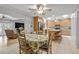Open-concept living area featuring a dining area adjacent to the kitchen with natural light at 37138 Lake Yale Pl, Grand Island, FL 32735
