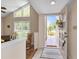 Inviting entryway features tile flooring, natural light, and decorative doorway at 37138 Lake Yale Pl, Grand Island, FL 32735