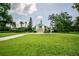 A spacious front yard leads up to this charming two-story home at 37138 Lake Yale Pl, Grand Island, FL 32735