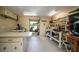 Finished garage with ample workspace, cabinets and storage, perfect for hobbies at 37138 Lake Yale Pl, Grand Island, FL 32735