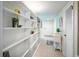 Hallway with shelving and access to the main living areas at 37138 Lake Yale Pl, Grand Island, FL 32735