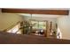 Bright home office space with desk, telescope and beamed ceiling at 37138 Lake Yale Pl, Grand Island, FL 32735