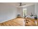 Bedroom with hardwood floors, neutral paint, and ceiling fan and lots of light at 4445 Blue Major Dr, Windermere, FL 34786