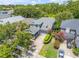 Charming two-story home with landscaped front yard and a driveway with two parked cars at 4445 Blue Major Dr, Windermere, FL 34786