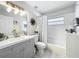Bright bathroom featuring a bath tub and shower combination, complemented by a single vanity at 4521 Eaglewood Dr, Leesburg, FL 34748