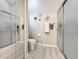 Bathroom featuring a shower and neutral walls at 4521 Eaglewood Dr, Leesburg, FL 34748