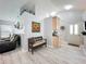 Inviting entryway featuring modern decor, leading to a comfortable living area at 4521 Eaglewood Dr, Leesburg, FL 34748