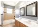 Bathroom featuring double vanity, bathtub, shower and tile flooring at 4548 Barrister Dr, Clermont, FL 34711