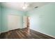 This bedroom includes closet and lots of wall art at 4548 Barrister Dr, Clermont, FL 34711